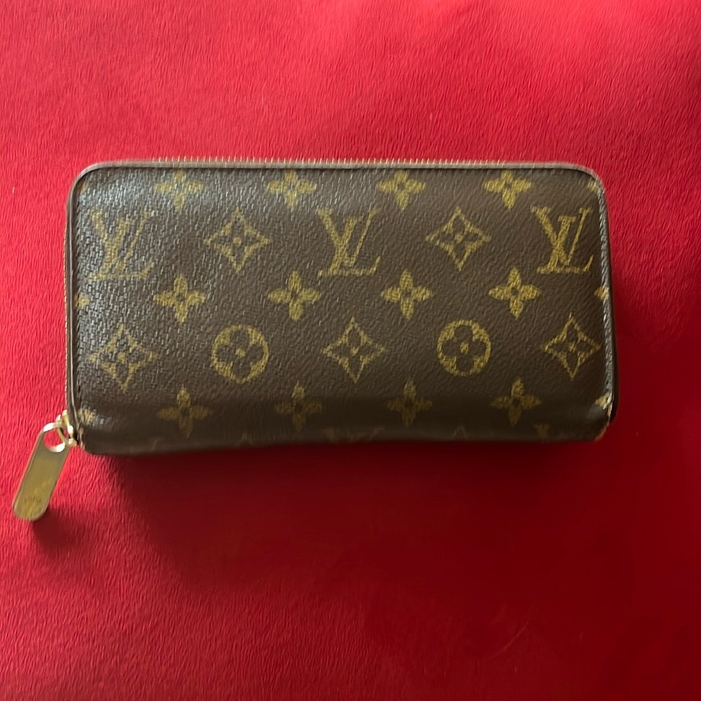 Gently used Lous Vuitton Zippy wallet straight from Paris